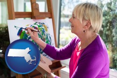 massachusetts map icon and an artist painting a picture