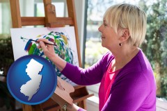 new-jersey map icon and an artist painting a picture