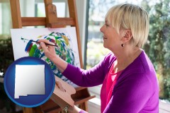 new-mexico map icon and an artist painting a picture