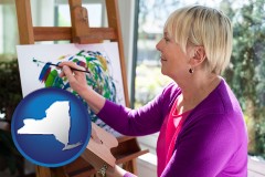 new-york map icon and an artist painting a picture