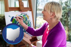 ohio map icon and an artist painting a picture